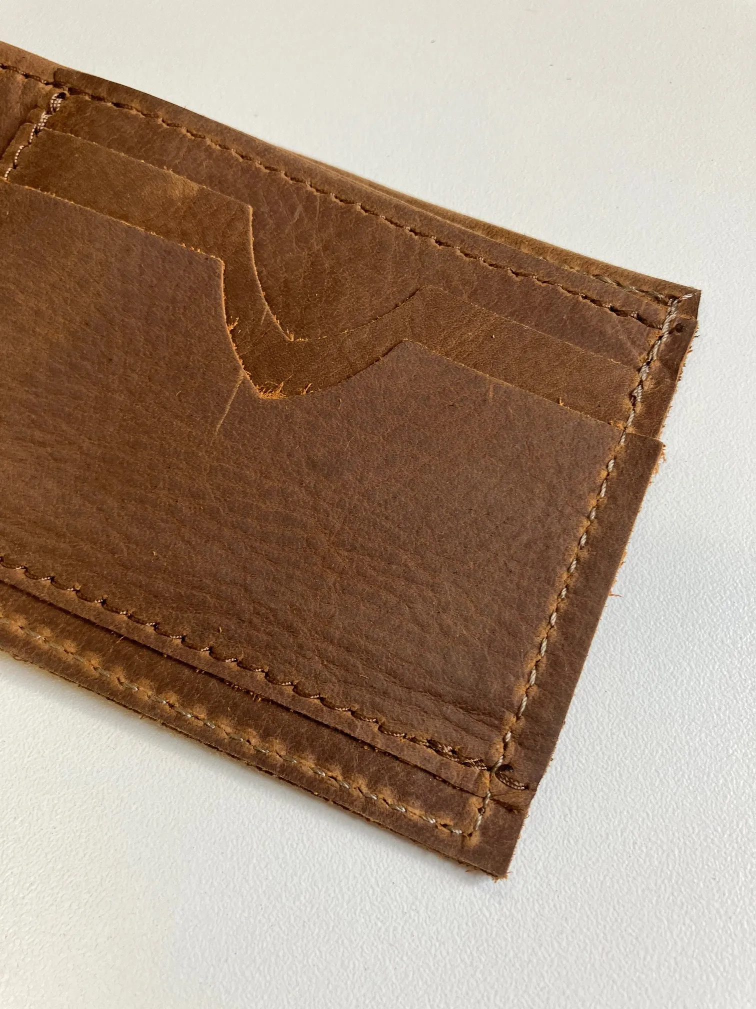 SAMPLE. Minimalist bifold mat brown leather wallet. handmade in Canada